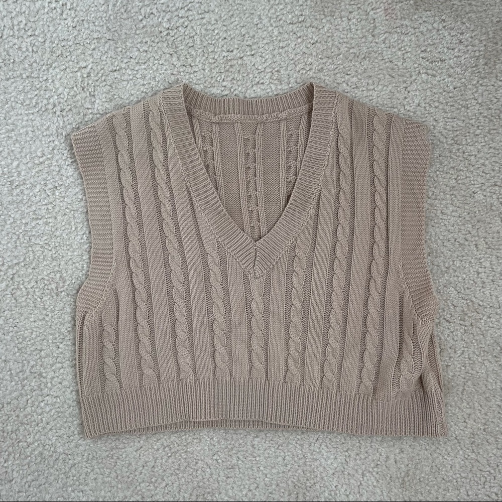 brown sweater vest